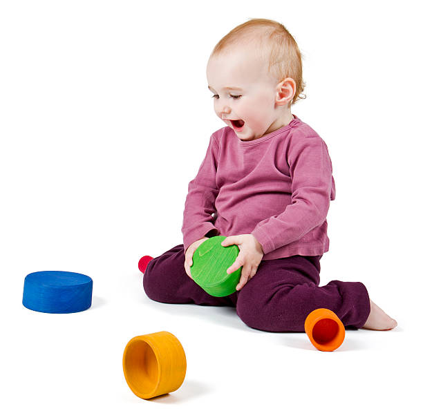 istock young child playing with colorful toy blocks 178178704