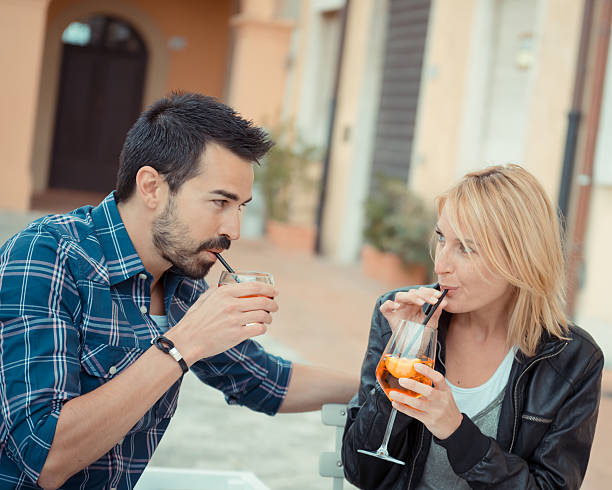 istock Couple drinking aperitif in a Bar 178178862