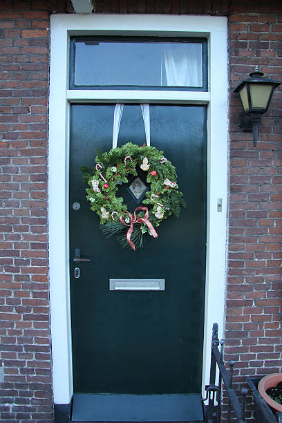 istock Christmas wreath on a door 178179291