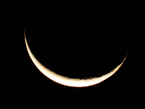 istock moon in wanning crescent phase with dark sky in the background 1781797912