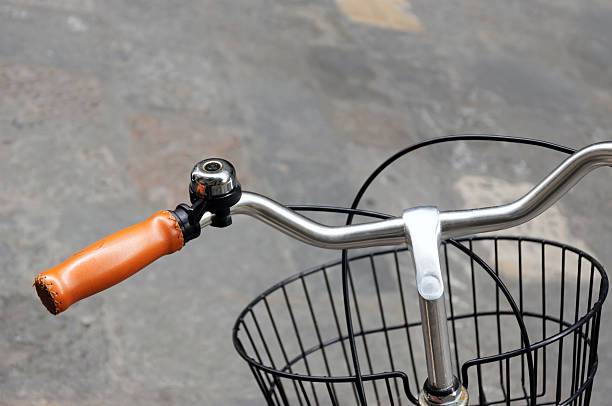 istock Yellow leather grip, metal bicycle bell and front basket 178180305
