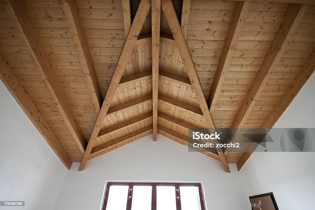 exposed wood beams in the living room wooden roof. Exposed beams in the living room. Architecture Stock Photo