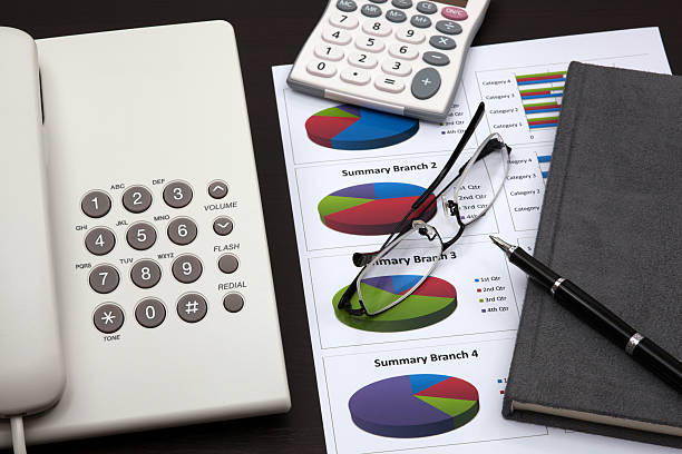 istock business report with telephone on a table 178181540