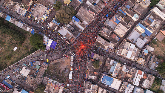 A birds eye view of huge crowd during hindu religious festival.ganesha chaturthi festival.immersion procession