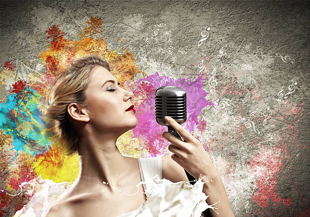 istock Female blonde singer 178183423