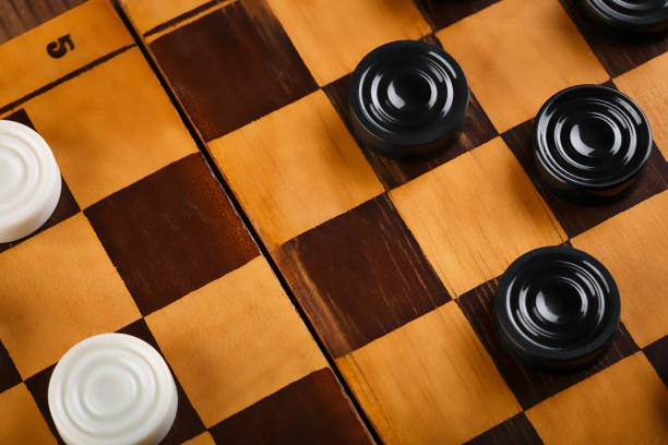 istock checkerboard with checkers. Game concept. Board game. Hobby. checkers on the playing field for a game. 1781838379