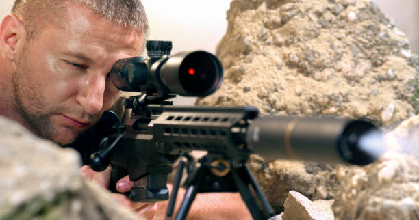 istock Soldier firing machine gun during battle 1781852803