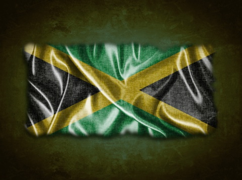 Illustration with a vintage Jamaica flag on green background.