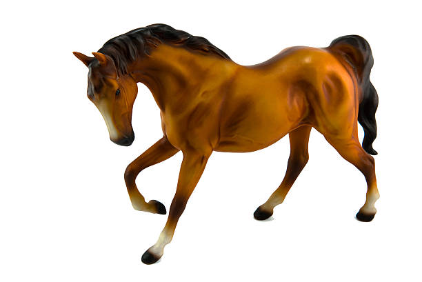 istock brown horse sculpture on white background 178186412