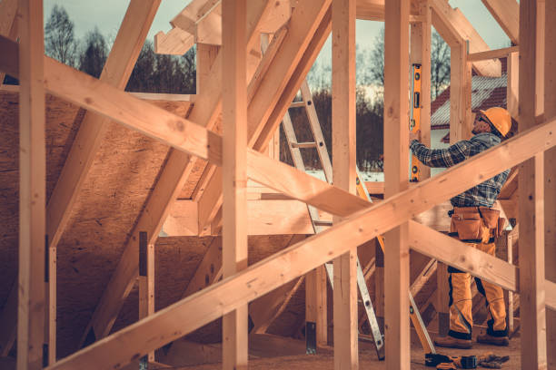 istock Construction Contractor Supervisor Performing Final Levels Check on Wooden Skeleton Frame 1781866021