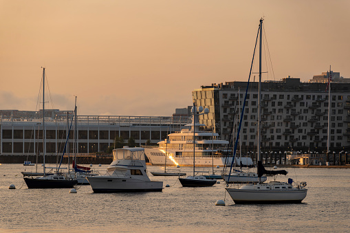Yachts moored in the harbour near Long Wharf in the Financial District in Boston.
