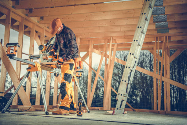 istock Carpentry Contractor Adjusting the Wood Plank with Circular Saw 1781870564