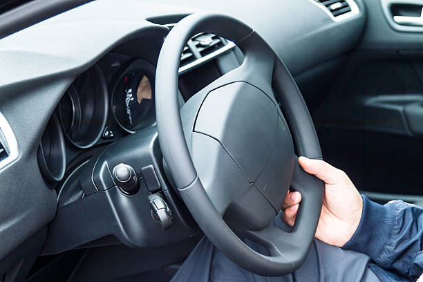istock Person driving a car 178187119
