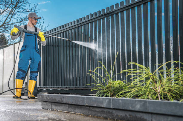 istock Caucasian Men Washing His Residential Driveway Gate 1781871653