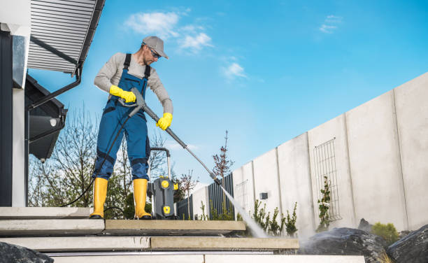 istock Men Washing His Backyard Garden Concrete Path and Stairs Using Pressure Washer 1781875110