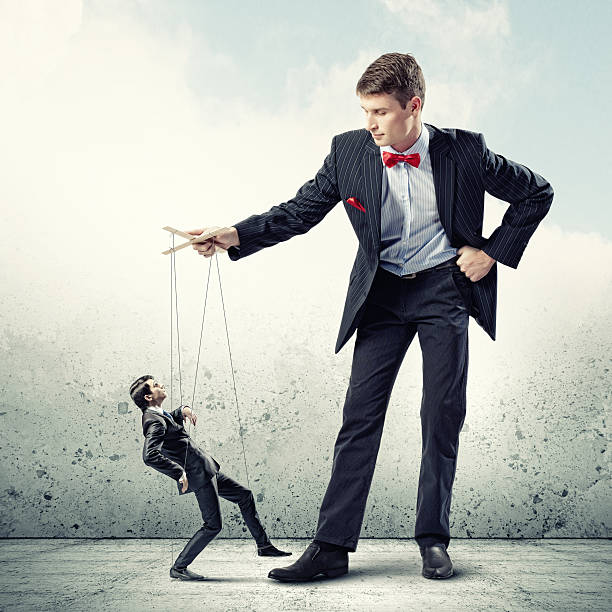 istock Businessman puppeteer 178187814