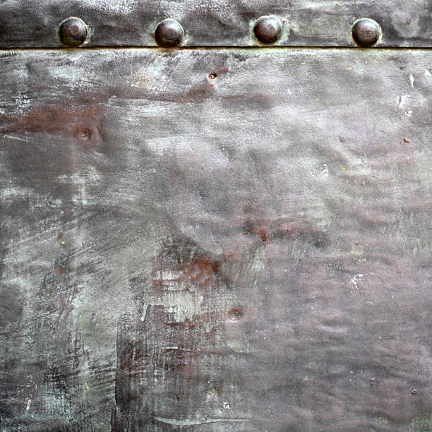 istock Black metal plate or armour texture with rivets 178188287