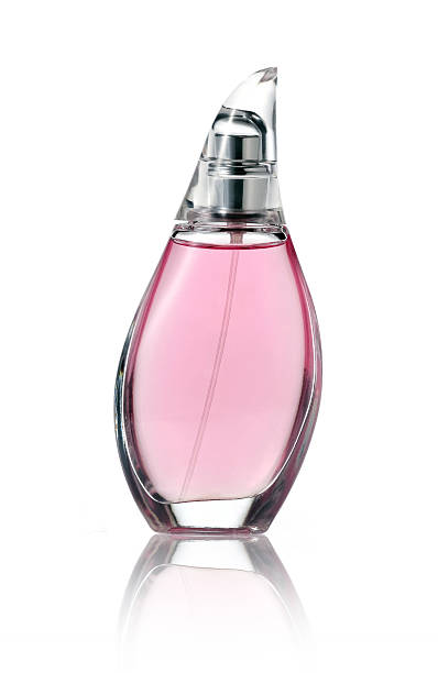 istock Glass of pink perfume bottle isolated on white 178189144