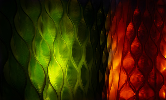 abstract plastic shape with red and green lights and shadows