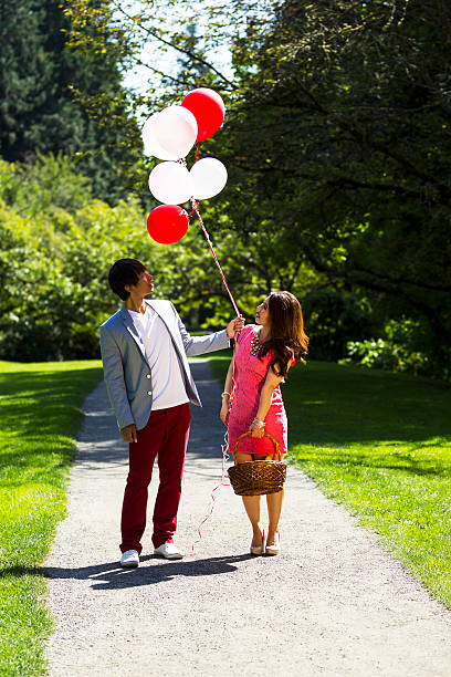 istock Young Adult Couple having Fun while going for a walk 178191003
