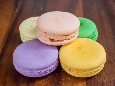 colorful macaroon on a wooden tray