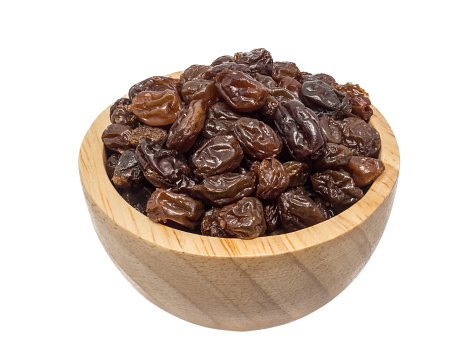 Dried raisins on isolated background
