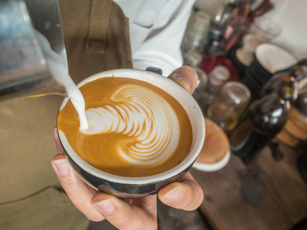 istock barista pouring milk latte art 1781936784