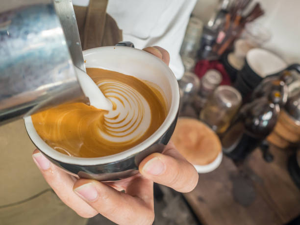 istock barista pouring milk latte art 1781943553