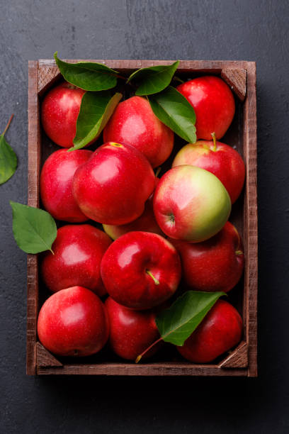 istock Wooden box with fresh red apples 1781949702