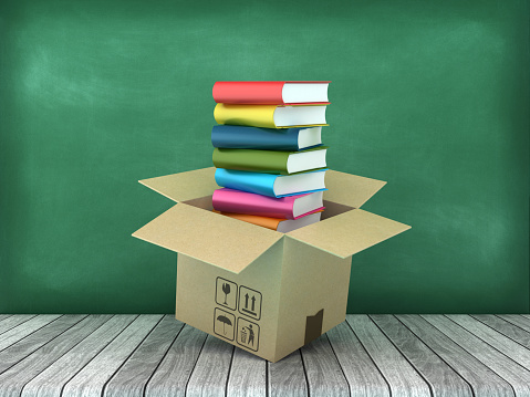 Stack of Books with Cardboard Box - Chalkboard Background - 3D Rendering