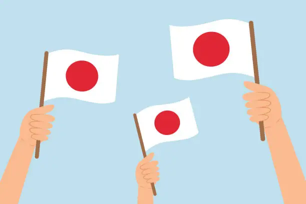 Vector illustration of People hands raising flags of Japan. Vector illustration of Japanese flags in flat style.
