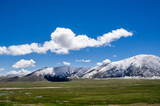 istock Plateau Snow mountain landform and grassland 1782029185