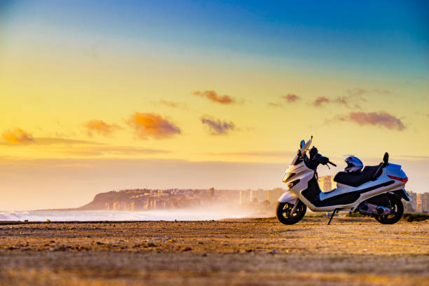 istock Scooter on beach at sunrise 1782060501