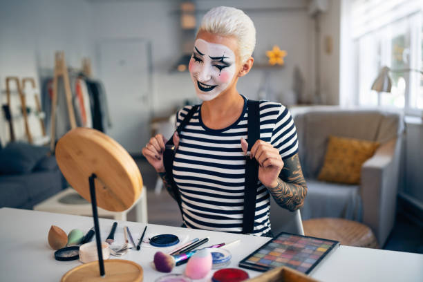 istock Young woman, a mime artist, getting ready for pantomime show. 1782077908