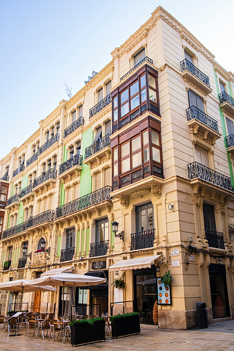 Building overlooking the Plaza del Abad Penalva, a small square located behind the Rambla of Alicante, famous for the co-cathedral of San Nicolas located on one side of the square