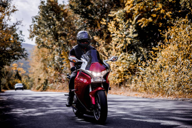 istock Man enjoys autumn motorcycle ride 1782093348
