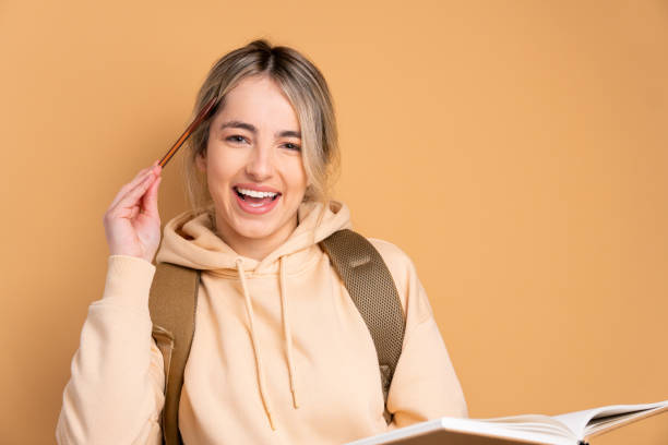 istock excited woman raising hand to question answer 1782095617