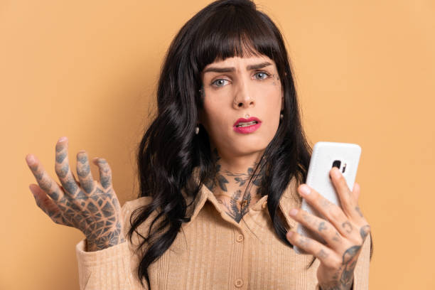 istock annoyed woman checking smartphone 1782097795