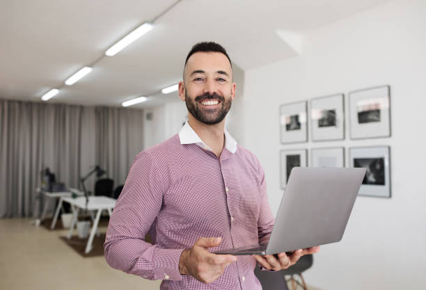 istock Happy confident handsome caucasian mature guy in shirt use laptop 1782100014