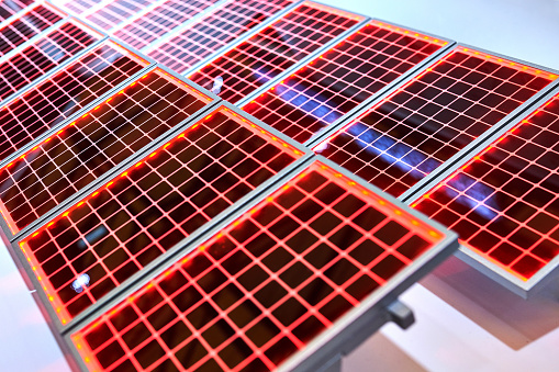 Close-up of two rows of solar panels.