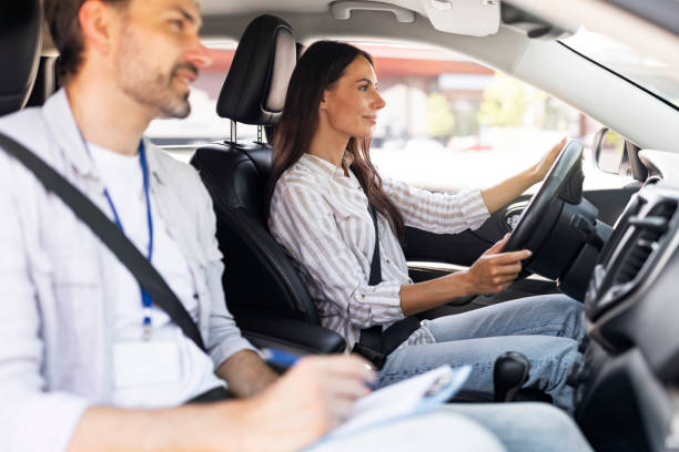 istock Confident young lady passing exams at driving school 1782124542