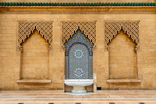 Water fountain in Rabat, Morocco. Ornate frame and ceramic tile decorations.