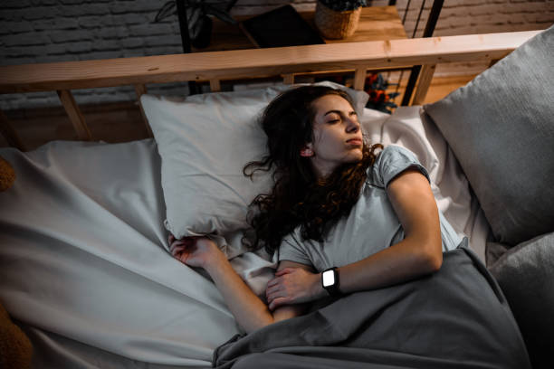 istock Female Twitching In Her Sleep With Smartphone Signifying Sleep Apnea Problems 1782154439