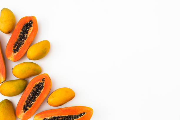 istock Papaya and mango fruits on white background. Flat lay. Top view 1782163696