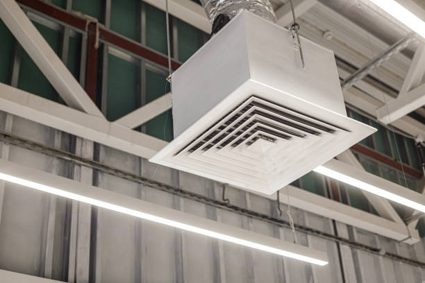 istock Square grid with supply ventilation duct in commercial building. Industrial ventilation system 1782165355