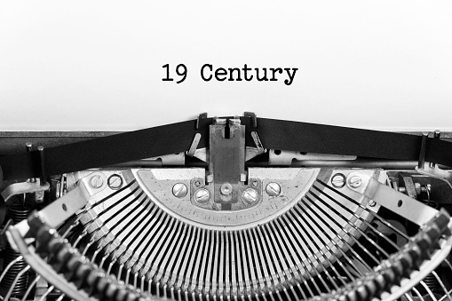 istock 19 century word closeup being typing and centered on a sheet of paper on old vintage typewriter mechanical 1782185530