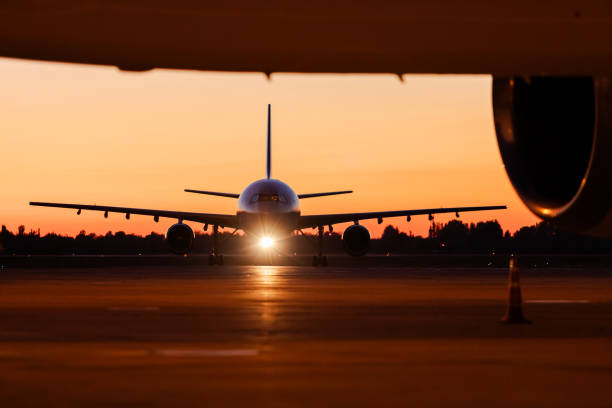istock Landing plane during beautiful sunset at airport 1782210257