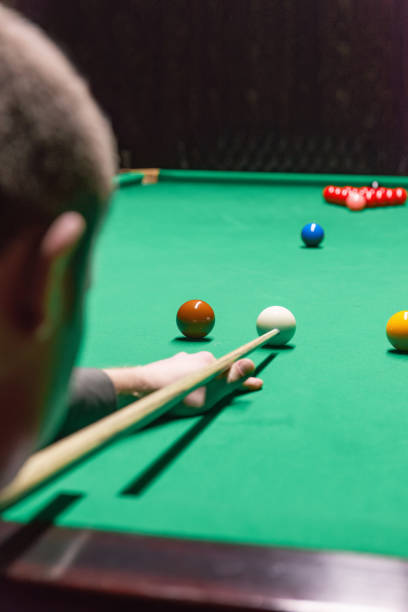istock A focused snooker player demonstrating skill and precision during a competitive game 1782214911