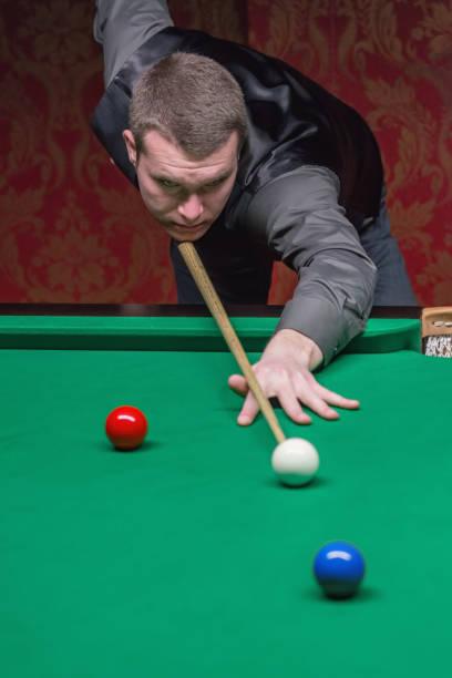 istock A skilled snooker player engaged in a captivating game of precision and strategy. 1782216063