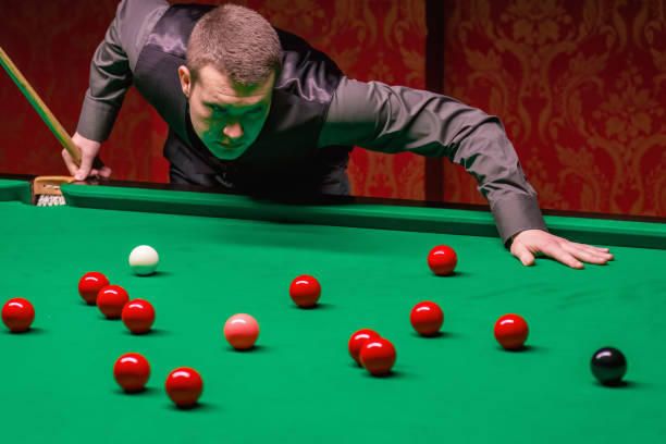 istock A focused snooker player demonstrating skill and precision during a competitive game 1782216699